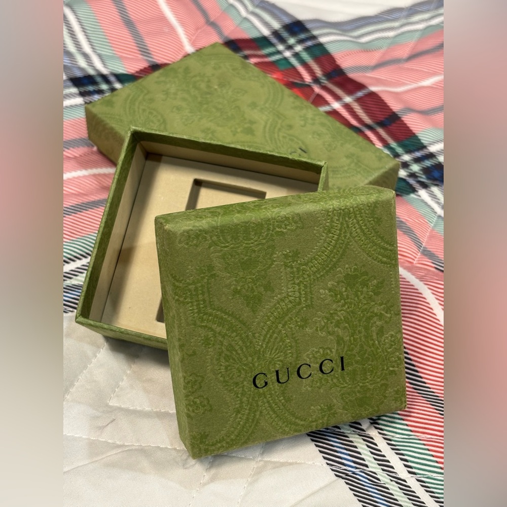 3 Gucci boxes:  key ring box, purse box, and business card holder box.